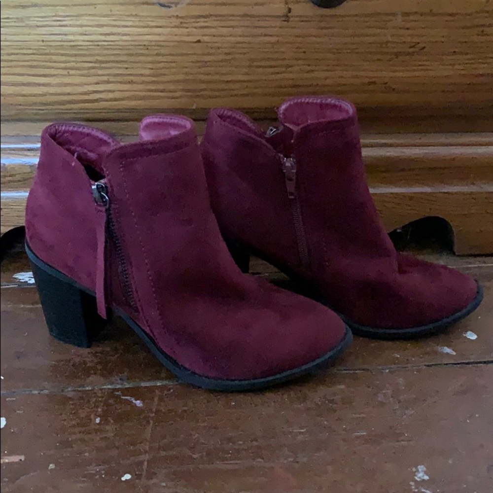 A burgundy ankle boot